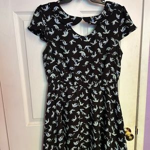 Short black dress with blue birds on it